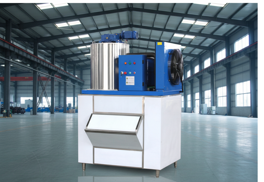 Industrial flake ice machine featuring a vertical stationary drum and a precision-machined stainless steel ice blade to minimize mechanical wear.