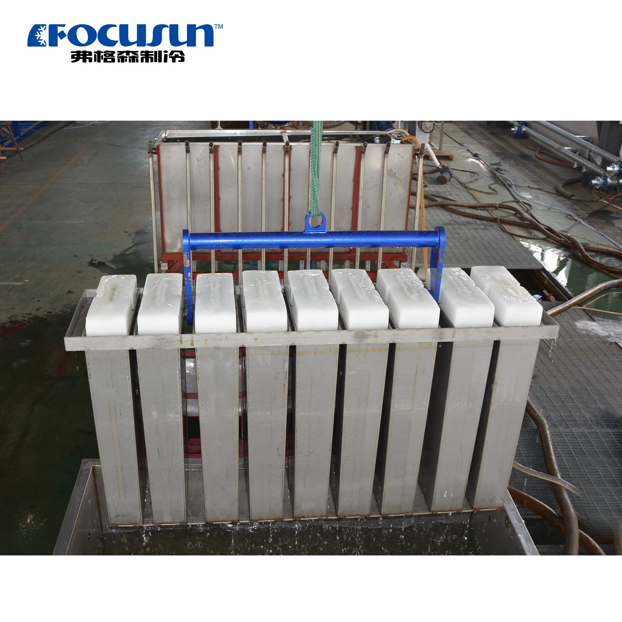 Industrial brine system block ice machine with corrosion-resistant titanium coils