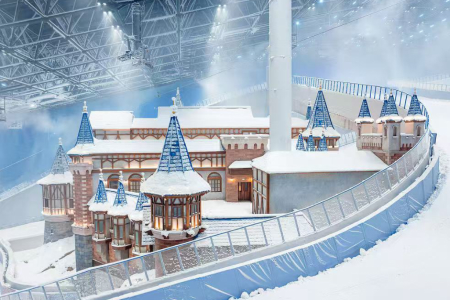 Immersive indoor snow world created with non-toxic, authentic cold snow for a multi-sensory visitor experience.